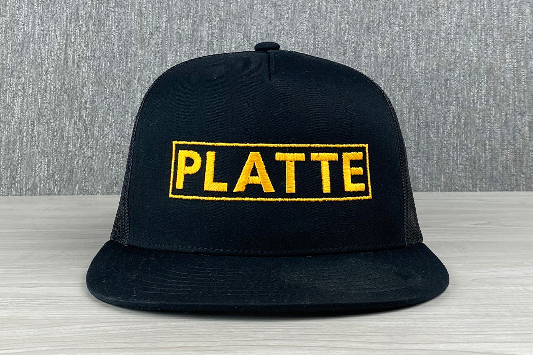 Platte Perry 5 Panel Trucker Hat Mid Profile Black Gold Snapback Main
